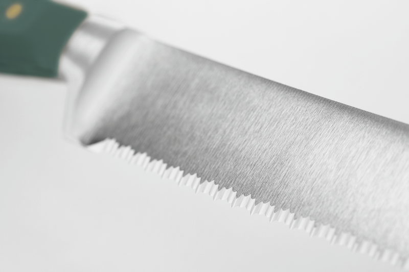 Close-up of a knife blade with a blurred background