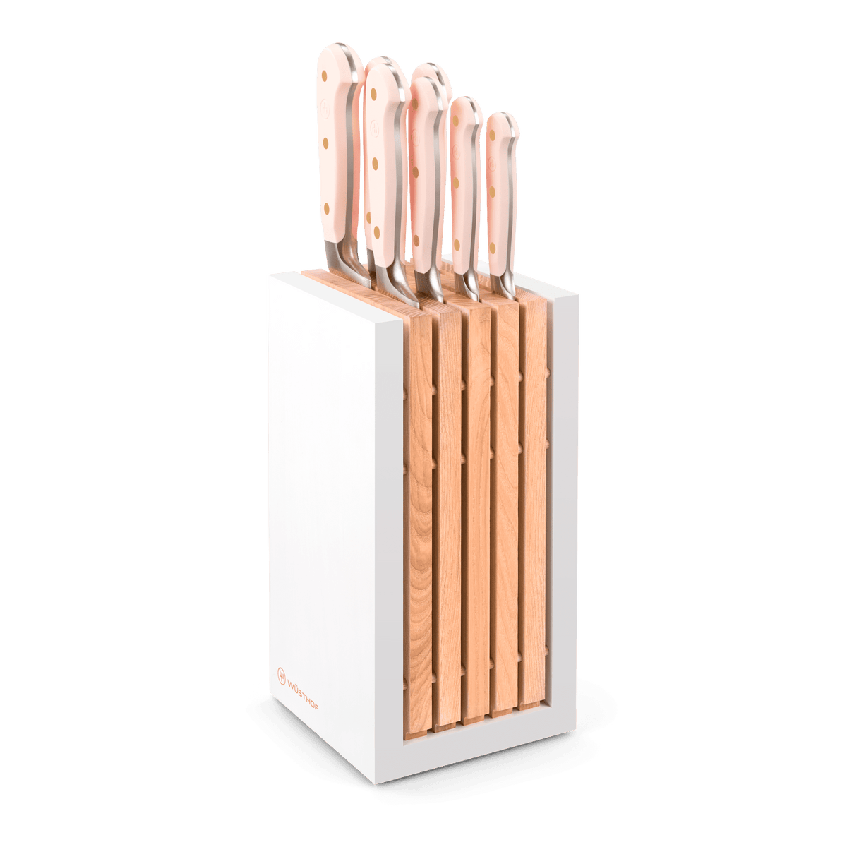 Modern knife block set featuring eight knives with light pink ergonomic handles and polished metal rivets, housed in a sleek wooden and white holder.