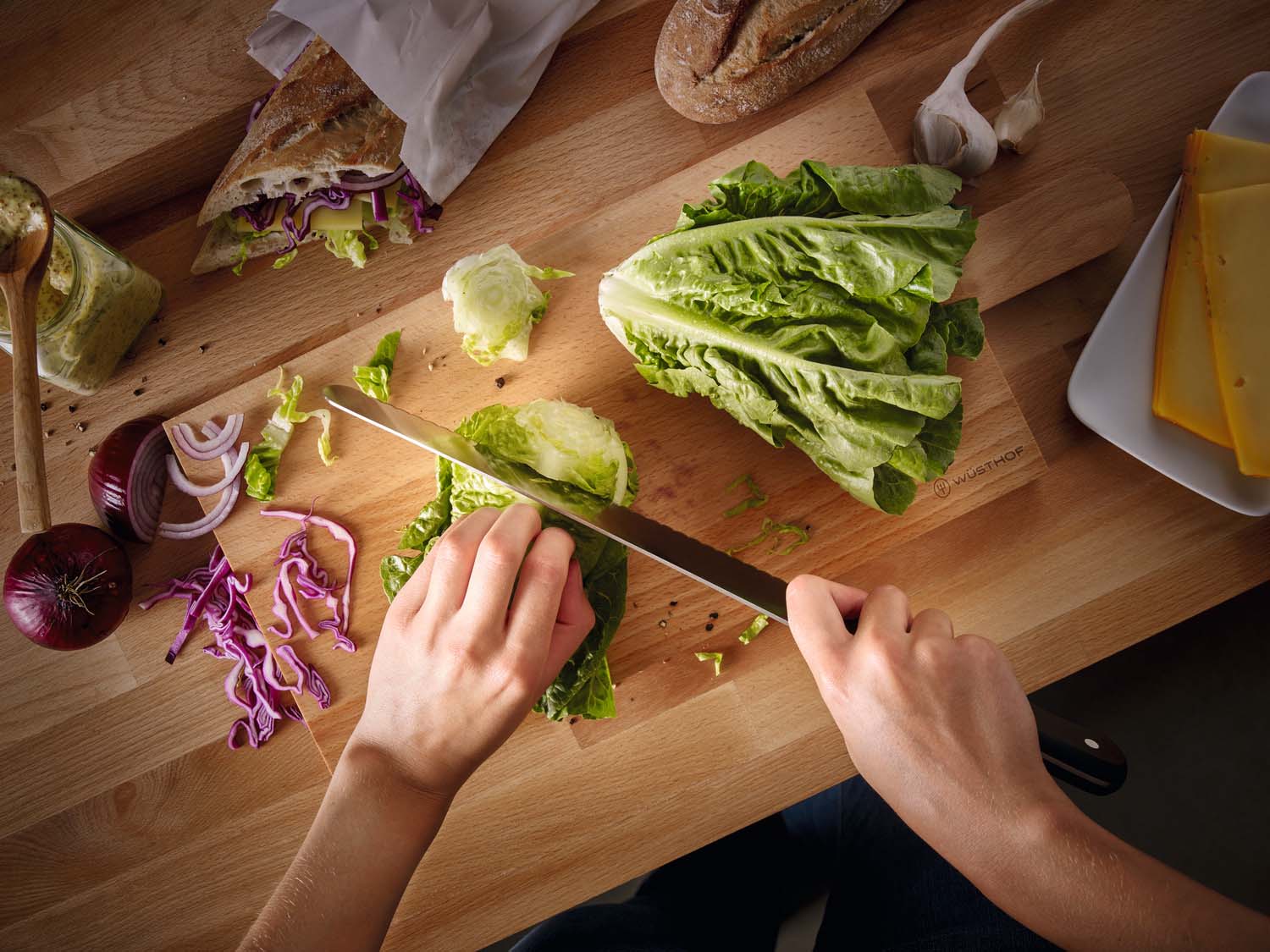 gourmet chef slicing cabbage